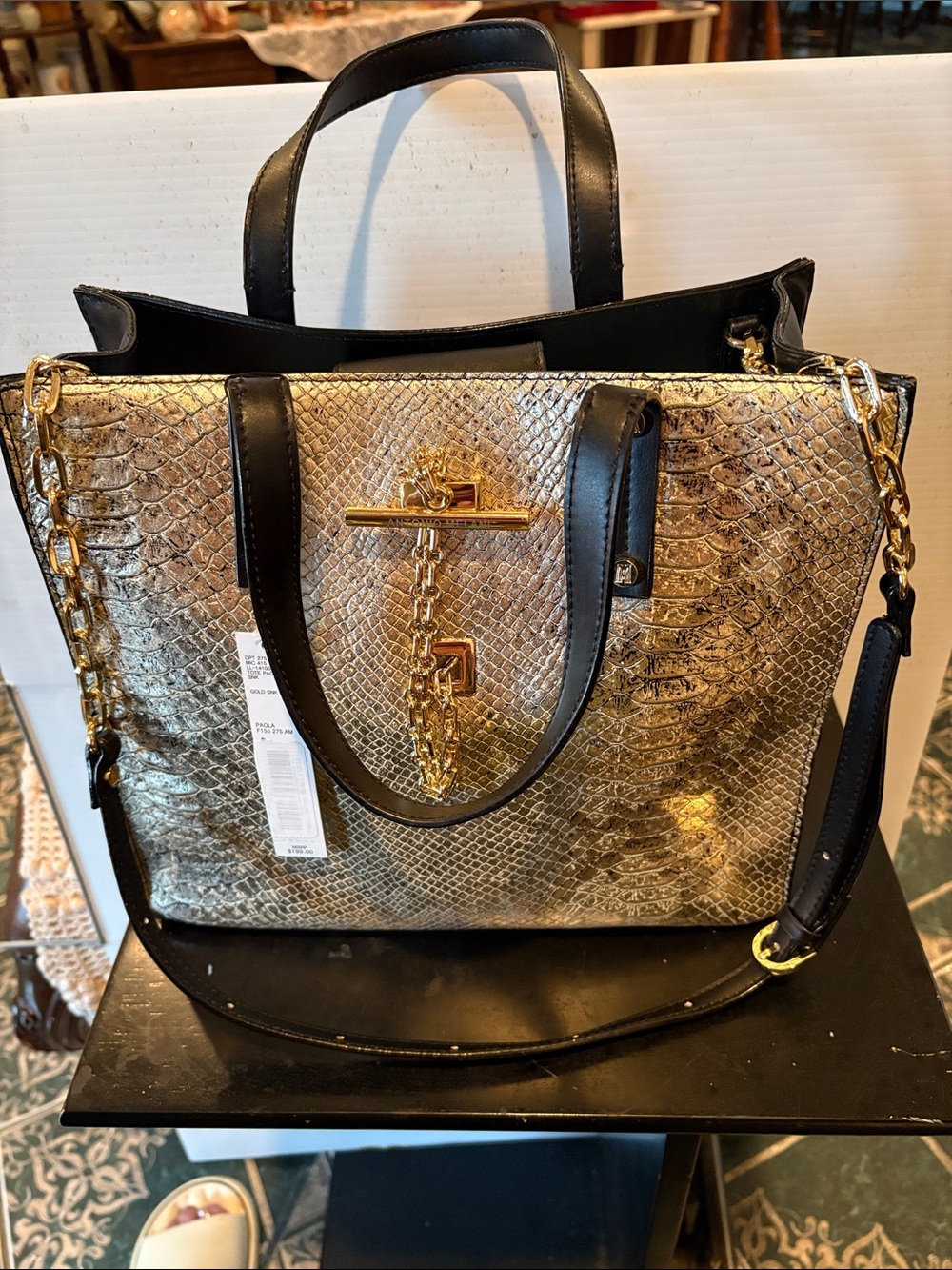 Antonio Melani Gold Snake-Embossed Tote Bag with Black Trim with gold chain